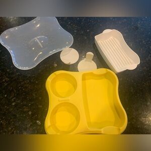 NWOT Microwave Egg Cooker, has removable pieces to assist with cooked items.